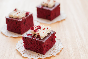 Red velvet cakes on wooden board