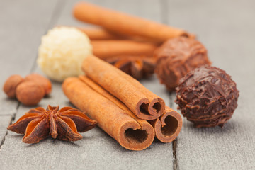 Cinnamon sticks, star anise and chocolate truffles