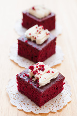Red velvet cakes on wooden board
