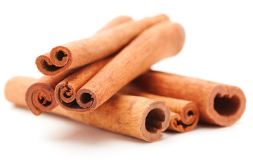 Cinnamon sticks over white isolated background