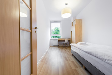 Modern and small sleeping room interior design in scandinavian style