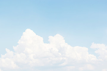 Naklejka na ściany i meble white clouds and blue sky background