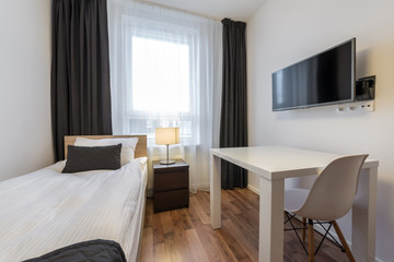 Small, modern sleeping room interior design