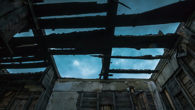 The sky through the shattered roof of the building