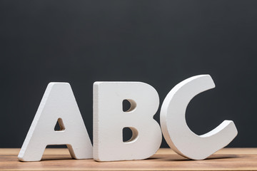 abc alphabet letters in front of blackboard - 88506983