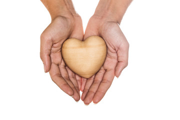 Obraz premium wooden heart in hands