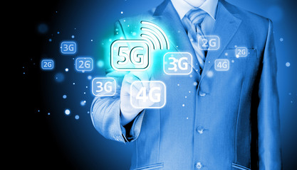 businessman holding in hand 5G, technology background