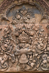 Detail of stone carving decoration in Banteay Srei .near Seim Reap, Cambodia