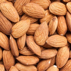 Peeled almonds closeup. For vegetarians.