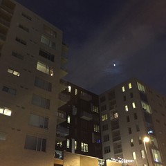 moon over downdown Denver luxury condos