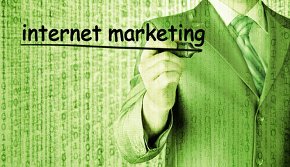 business man writing internet marketing