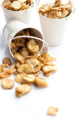 Broad beans on a white background