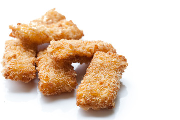 Fried fish nuggets on white background