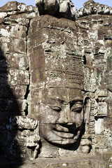 Carved stone face at the Bayon 1100's buddhist temple.near Siem Reap,Cambodia