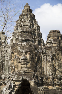 Carved stone face at the Bayon 100's buddhist temple.near Siem Reap,Cambodia