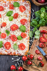 Making Homemade classic margherita pizza