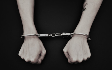Hands with Handcuffs