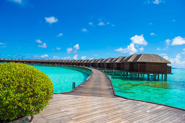 Beautiful tropical view of water villas on perfect ideal island