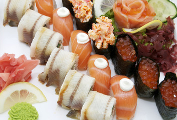 serving traditional Japanese sushi on white background