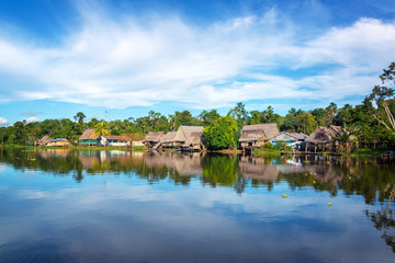 Fototapeta na wymiar Town on the shore of the Yanayacu River in the Amazon rain forest near Iquitos, Peru