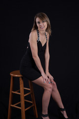 Fototapeta premium Happy woman sitting down
