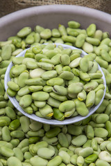 Fresh raw broad beans in food market, Ecuador