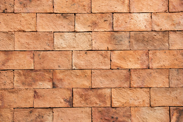 Orange brick wall texture and background.