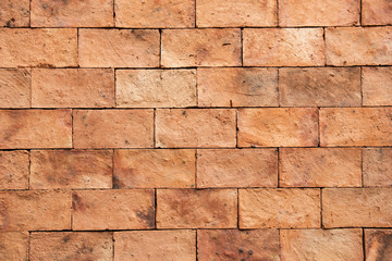 Orange brick wall texture and background.