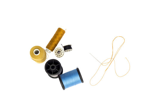 Thread and reel on the white background.Cut for isolated.