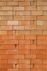 Red clay brick wall background.