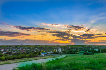 Fototapeta premium Sunset over village