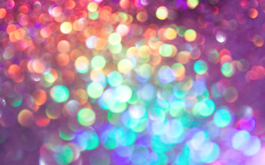 bokeh lights background with multi colors with motion blur.