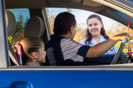 Female Child Happy Expression At Car Window