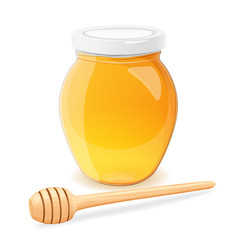 A jar of honey and spoon for honey.