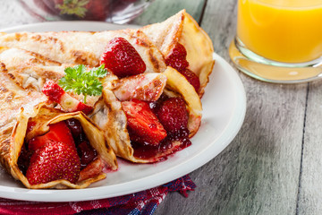 Traditional crepes served with strawberries