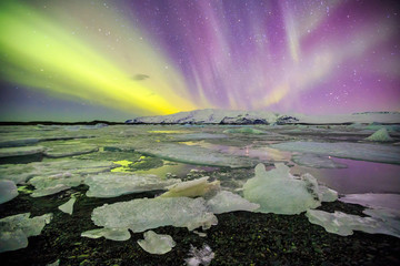 Auroral over the glacier lagoon Jokulsarlon in Iceland. © f11photo
