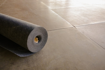 The Roll of Black Carpet at the Constructionsite