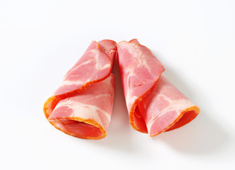 Slices of smoked pork - rolled up
