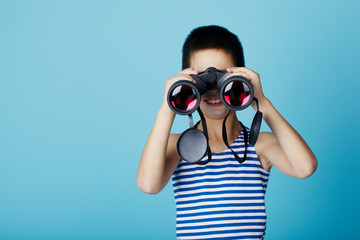 sailor with binoculars on sky blue background