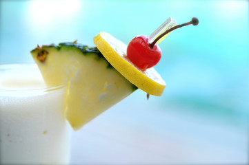Pina colada, a sweet, rum-based cocktail made with rum, cream of coconut, and pineapple juice. 