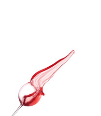 Red wine splashing from glass, isolated on white background