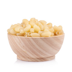 Pasta in wooden bowl, isolated on white background