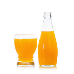 Orange juice in glass isolated on white black ground