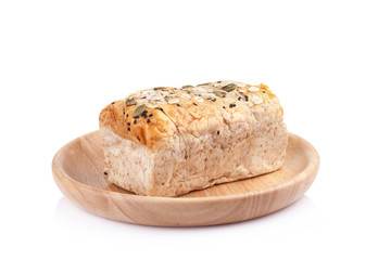 whole wheat bread in the wooden plates isolated on white backgro