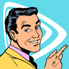 man shows the direction of your finger and smiles