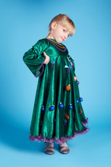 little girl with christmas tree dress