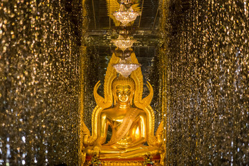 Golden buddha statue in temple. Places of worship.