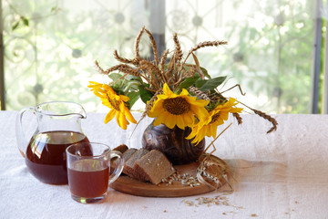 Bouquet from sunflowers and house kvass (kvas)
