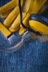 Noise insulation earmuffs claw hammer and pair of leather protec
