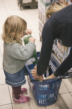 Toddler And Mother In Supermarket